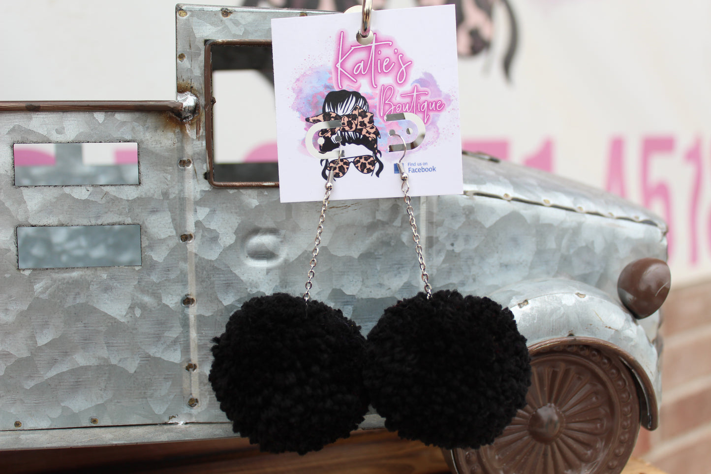 black pom pom earings